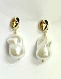 Hailwood Pearl earrings with gold clasps on a white background